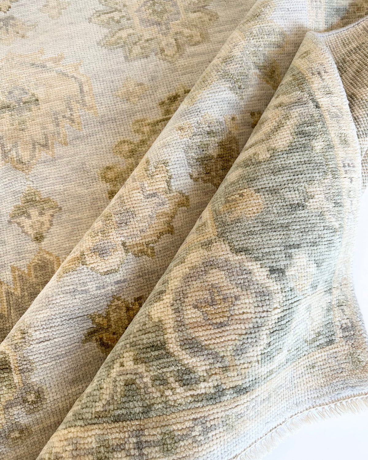 Close-up of textured fabric with a pattern on a white background