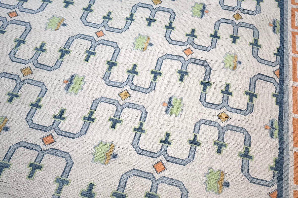 Close-up of a patterned rug with geometric design