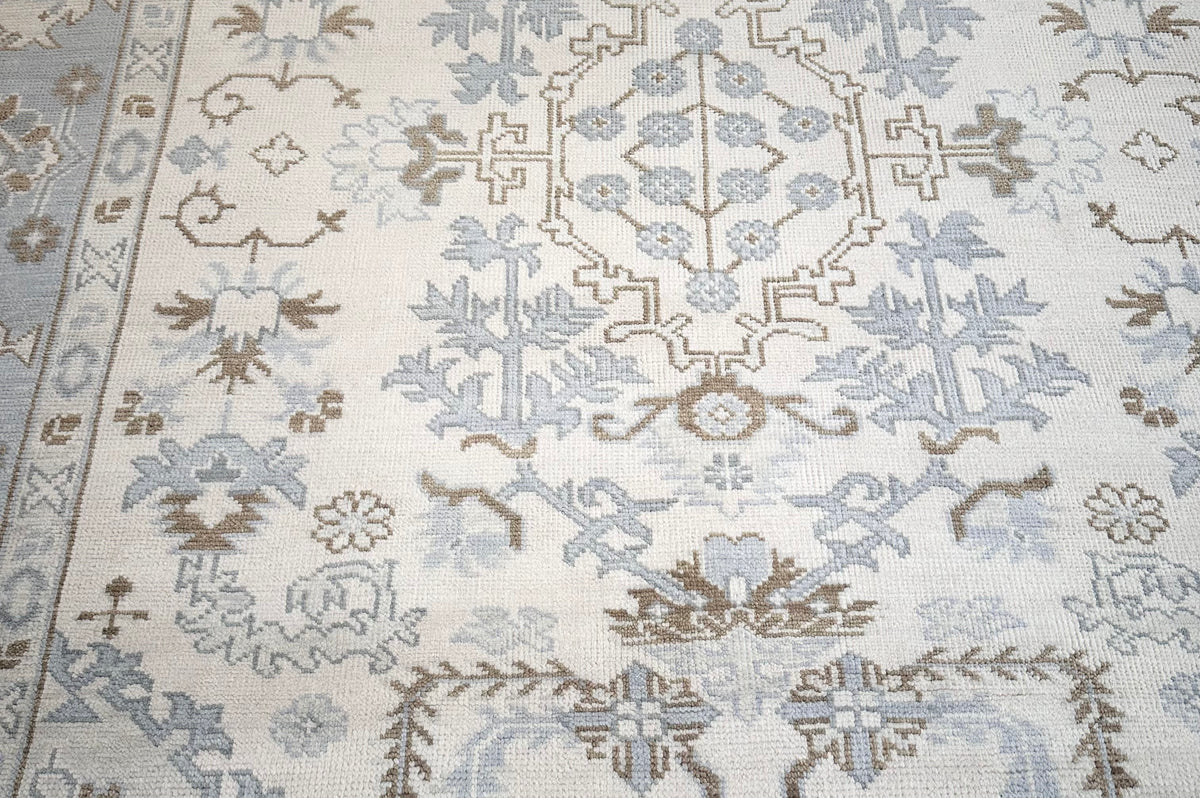 Decorative rug with intricate patterns on a neutral background